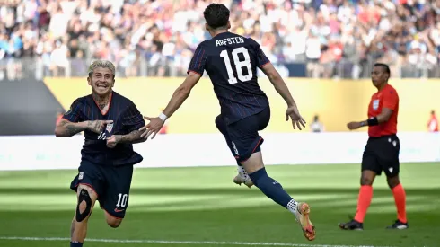 Diego Luna #10 of United States celebrates with Max Arfsten #18 after scoring a goal against Costa Rica.