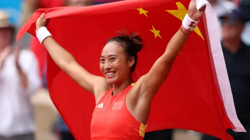 Qinwen Zheng of Team People’s Republic of China celebrates match point during the Tennis Women's Singles Gold Medal match against Donna Vekic of Team Croatia on day eight of the Olympic Games Paris 2024.