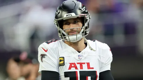 Kirk Cousins #18 of the Atlanta Falcons looks on before the game against the Minnesota Vikings at U.S. Bank Stadium on December 08, 2024 in Minneapolis, Minnesota.