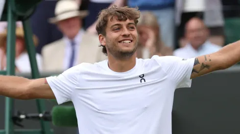 Flavio Cobolli of Italy celebrates his victory against Marin Cilic of Croatia during the Gentlemen's Singles fourth round match on day eight of The Championships Wimbledon 2025.