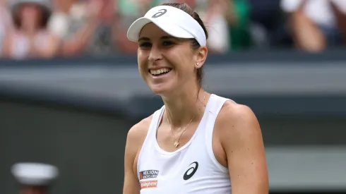 Belinda Bencic of Switzerland celebrates winning match point against Mirra Andreeva during the Ladies' Singles quarter-final match on day ten of The Championships Wimbledon 2025.