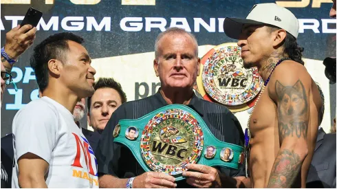Manny Pacquiao (L) and WBC welterweight champion Mario Barrios (R) face off