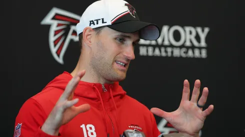 Quarterback Kirk Cousins #18 of the Atlanta Falcons speaks to the media during OTA offseason workouts at the Atlanta Falcons training facility on May 14, 2024 in Flowery Branch, Georgia.