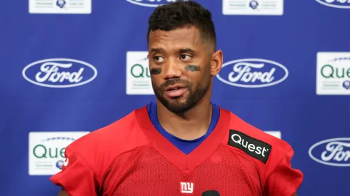 Russell Wilson #3 of the New York Giants talks to reporters during training camp at Quest Diagnostics Training Center on July 23, 2025 in East Rutherford, New Jersey.