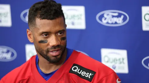 Russell Wilson #3 of the New York Giants talks to reporters during training camp at Quest Diagnostics Training Center on July 23, 2025 in East Rutherford, New Jersey.