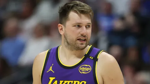 Luka Doncic #77 of the Los Angeles Lakers plays the Denver Nuggets in the fourth quarter at Ball Arena.