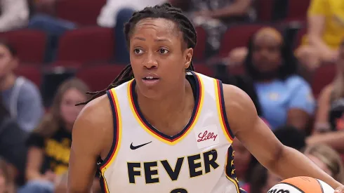 Kelsey Mitchell #0 of the Indiana Fever dribbles against the Chicago Sky during the second half at the United Center on July 27, 2025.
