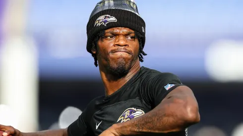Lamar Jackson #8 of the Baltimore Ravens warms up before a preseason game against the Philadelphia Eagles at M&T Bank Stadium on August 9, 2024 in Baltimore, Maryland.
