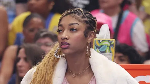 Angel Reese #5 of the Chicago Sky looks on from the bench against the Indiana Fever during the first half