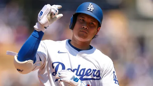 Shohei Ohtani #17 of the Los Angeles Dodgers reacts after hitting a two-run home run to notch his 1000th MLB career hit in the third inning against the St. Louis Cardinals at Dodger Stadium on August 06, 2025 in Los Angeles, California.