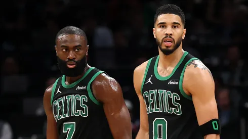 Jayson Tatum #0 of the Boston Celtics and Jaylen Brown #7 look on in Game Five of the Eastern Conference First Round NBA Playoffs against the Orlando Magic.