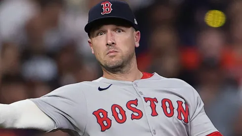 Alex Bregman #2 of the Boston Red Sox throws to first base during the fifth inning against the Houston Astros.