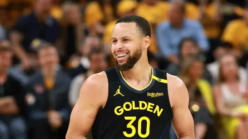 Stephen Curry #30 of the Golden State Warriors laughs against the Houston Rockets during the NBA Playoffs.