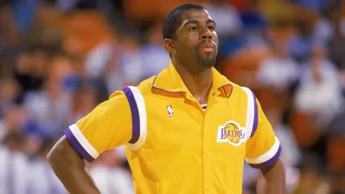 Magic Johnson #32 of the Los Angeles Lakers stands during warm ups before an NBA game at the Great Western Forum in Los Angeles, California in 1987.