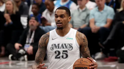 P.J. Washington #25 of the Dallas Mavericks dribbles the ball