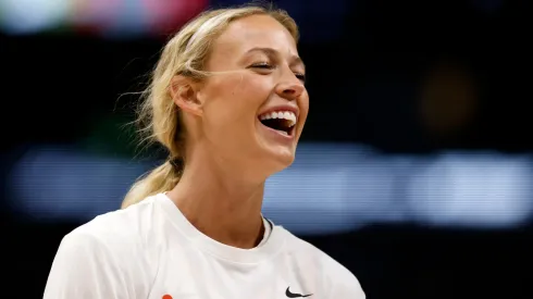 Sophie Cunningham #8 of the Indiana Fever laughs before the start of the game.