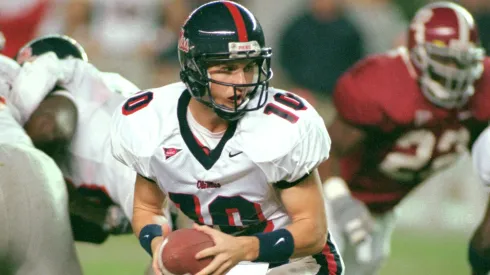 Eli Manning #10 of Mississippi Rebels moves with the ball during the game against Alabama Crimson Tide in 2000.