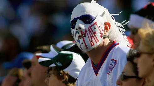 Fans that are members of the Bills Mafia look at the scoreboard in the fourth quarter in 2011.