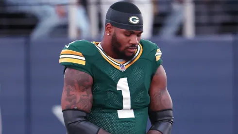 Micah Parsons #1 of the Green Bay Packers takes a knee.