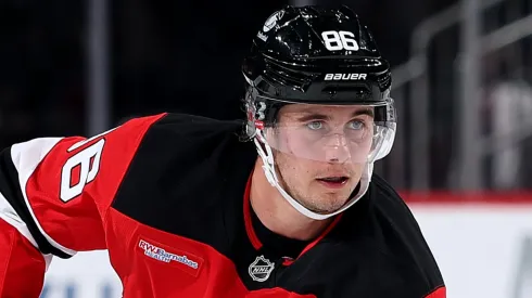 Jack Hughes #86 of the New Jersey Devils controls the puck.