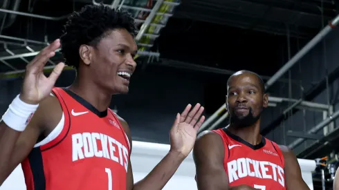 Kevin Durant #7 and Amen Thompson #1 of the Houston Rockets pose for a photo.