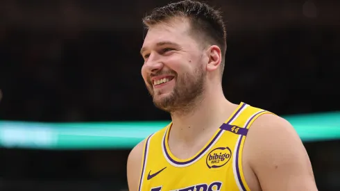 Luka Doncic #77 of the Los Angeles Lakers smiles during an NBA game.