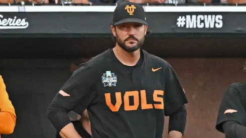 Head coach Tony Vitello looks out from the dugout.