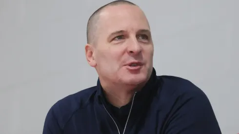 General Manager Mathieu Darche watches practice.