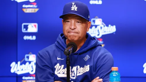 Manager Dave Roberts #30 of the Los Angeles Dodgers speaks to the media.