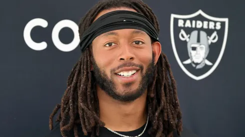 Jakobi Meyers smiles at a press conference.