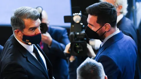 FC Barcelona President Joan Laporta and Lionel Messi speak.