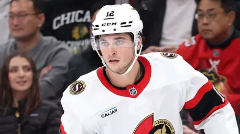 Shane Pinto #12 of the Ottawa Senators skates against the Chicago Blackhawks.