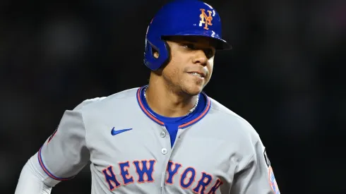 Juan Soto #22 of the New York Mets rounds the bases after hitting a solo home run.