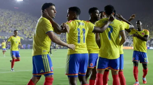 Colombia celebrate a goal against New Zealand.
