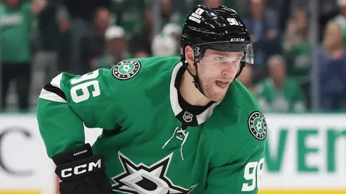 Mikko Rantanen #96 of the Dallas Stars controls the puck during a game.
