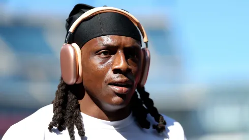 Jaycee Horn warms up against the Patriots on September 28, 2025 in Foxborough.