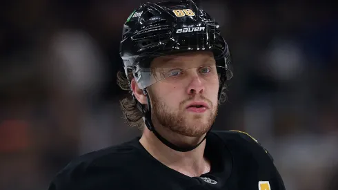 David Pastrnak #88 of the Boston Bruins looks on during the game.