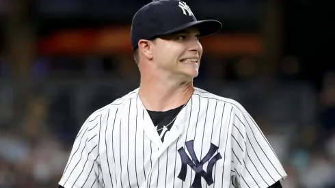 Sonny Gray with the New York Yankees walks back to the dugout.