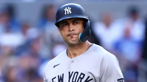 Giancarlo Stanton #27 of the New York Yankees reacts.