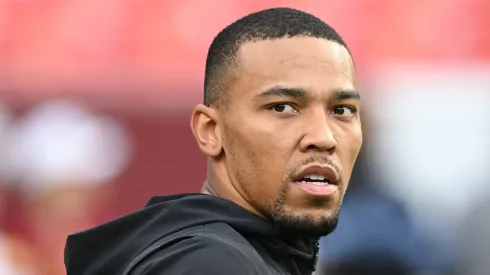 Amon-Ra St. Brown #14 of the Detroit Lions warms up.