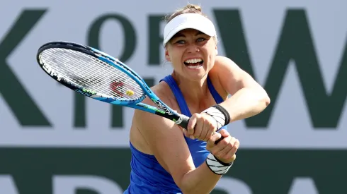 Vera Zvonareva returns a ball during a game.