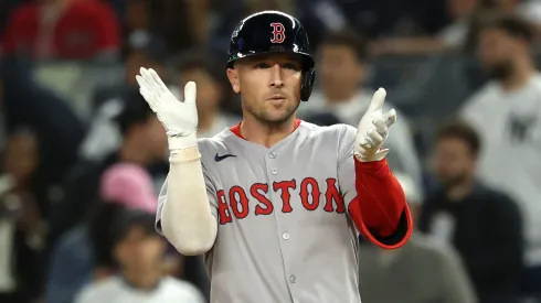Alex Bregman #2 of the Boston Red Sox reacts after hitting a single.