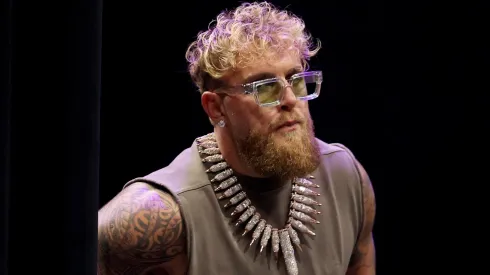 Jake Paul walks onto the stage prior to the press conference.