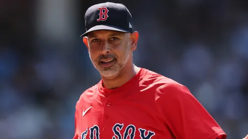 Manager Alex Cora #13 of the Boston Red Sox argues with umpire.