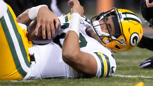 Jordan Love reacts after being hit during the 2nd quarter vs the Bears on December 20, 2025 in Chicago.