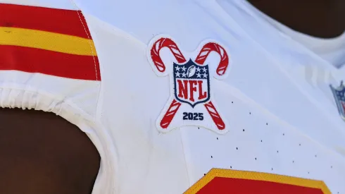 NFL logo with holiday candy canes.