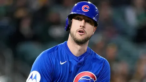 Kyle Tucker #30 with the Cubs tosses his bat away after he hit a solo home run.