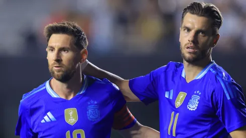 Lionel Messi and Giovani Lo Celso during a game.