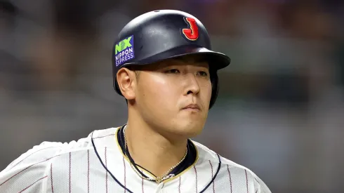 Kazuma Okamoto of Team Japan runs to first base on March 20, 2023 in Miami.