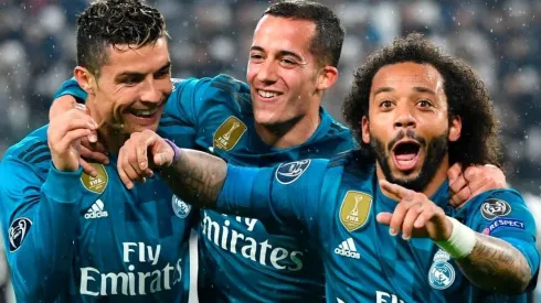 FESTEJO BLANCO. Cristiano Ronaldo, Lucas Vázquez y Marcelo celebran el tercer gol del Real Madrid.